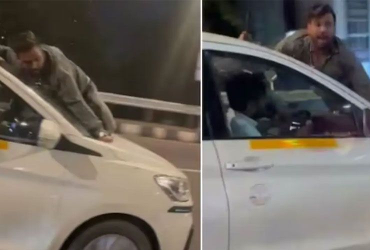 man clings on maruti ertiga bonnet mumbai