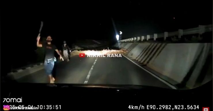 men with knives chase car