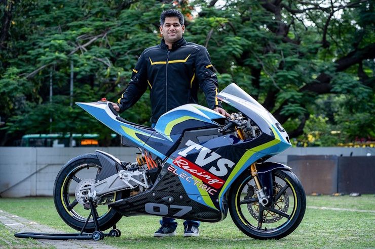 tvs motors md sudarshan venu posing with tvs apache rte electric race bike