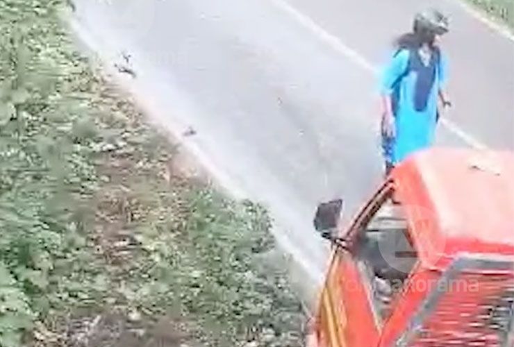 woman on scooter escapes getting crushed by dumper truck