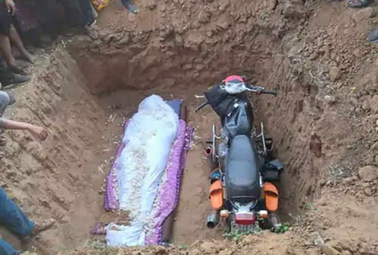 deceased biker buried with his royal enfield motorcycle