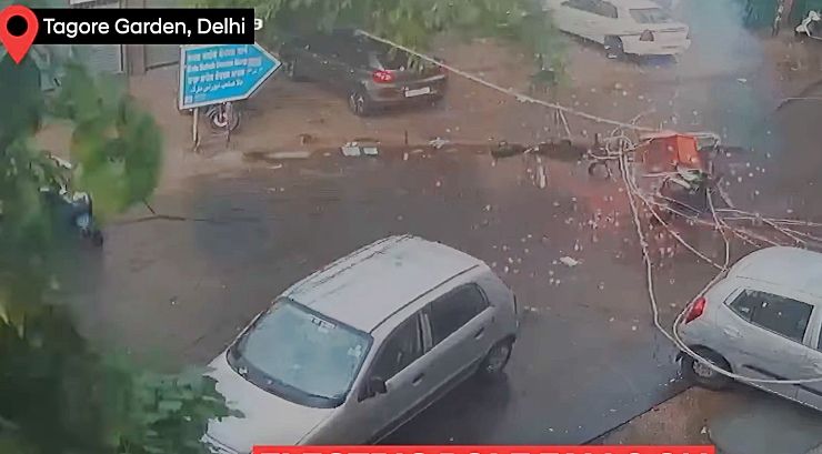 electric-pole-falls-on-scooter