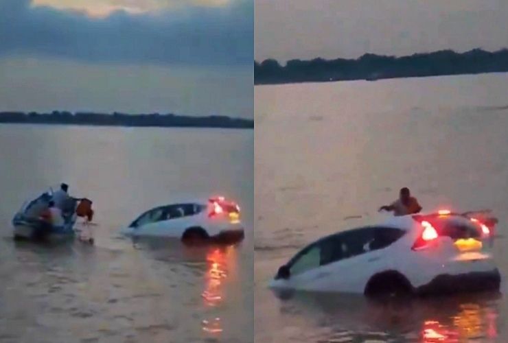 honda crv goes into river ganga locals save