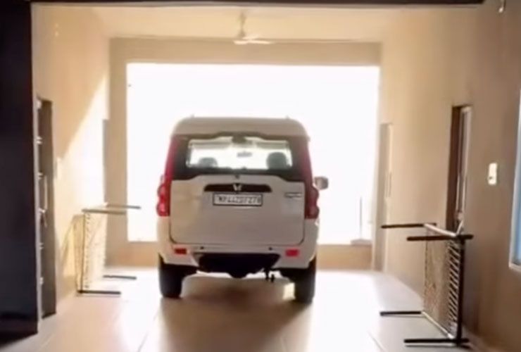 man builds room for mahindra scorpio classic inside his home