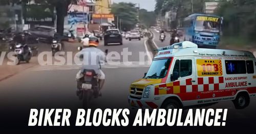 biker blocks ambulance biker blocks ambulance
