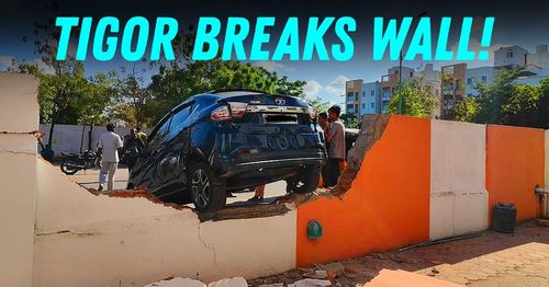 tata tigor breaks wall featured