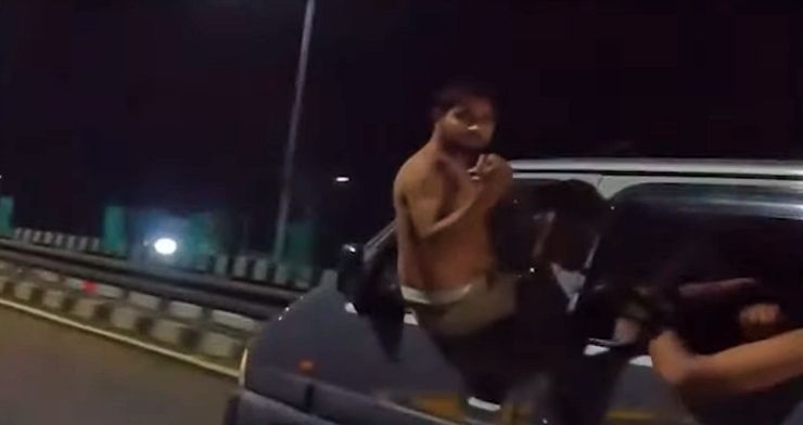 woman rider harassed by men with vulgar gestures