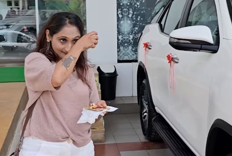 woman sheds happy tears on buying toyota fortuner